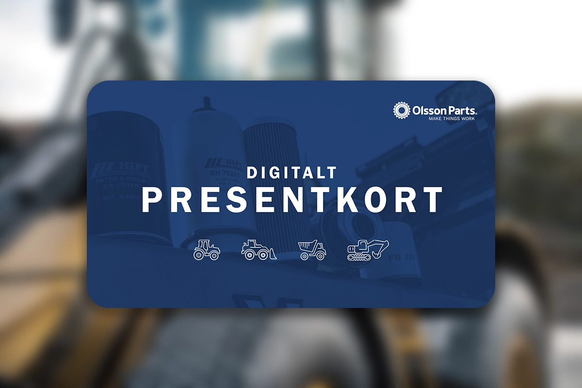 Ett presentkort fr&aring;n Olsson Parts framf&ouml;r en suddig bild av en Caterpillar hjullastare.